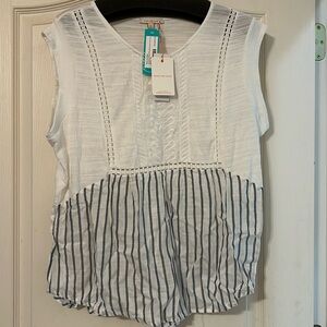 White and blue sleeveless blouse.